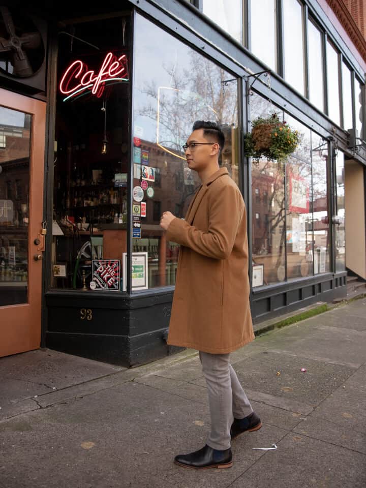 Person looking towards a shop.