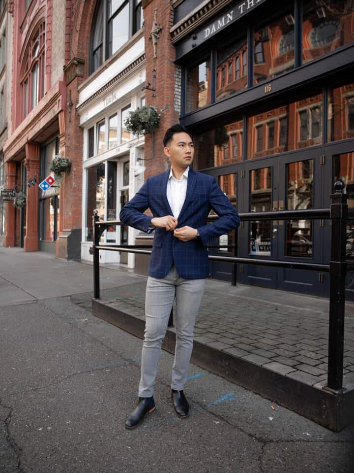 blue shirt gray pants black shoes