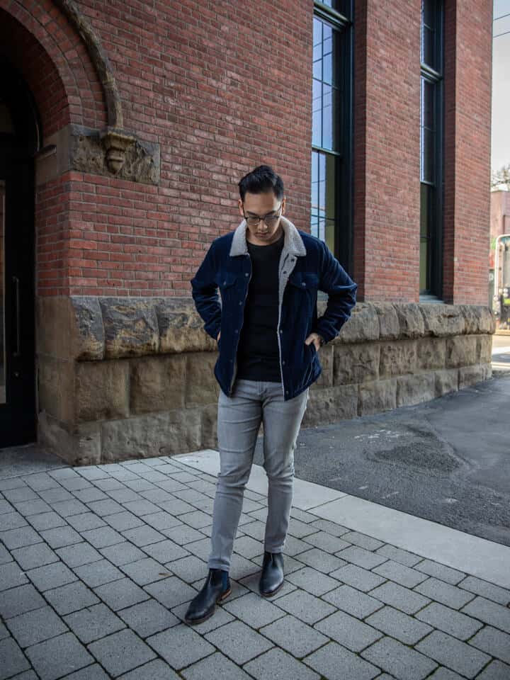 A man wearing a corduroy jacket.