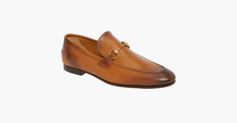 Tan leather loafer.