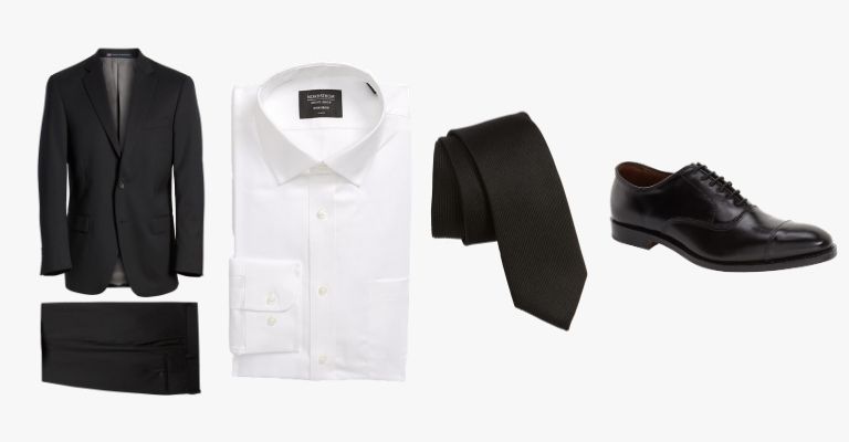 Black suit, white button-up, black tie, black shoes.