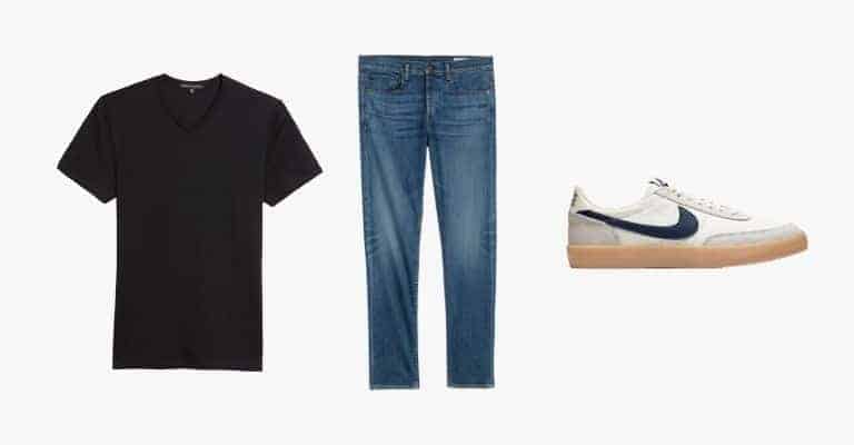 Collection of a black v-neck t-shirt, blue jeans, and white sneaker with a gum sole.