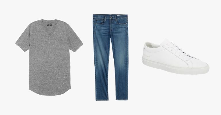 Collection of a grey v-neck t-shirt, blue jeans, and a white sneaker.