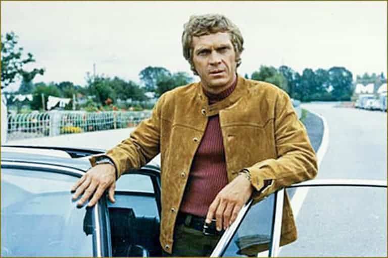 Steve McQueen wearing a suede jacket.