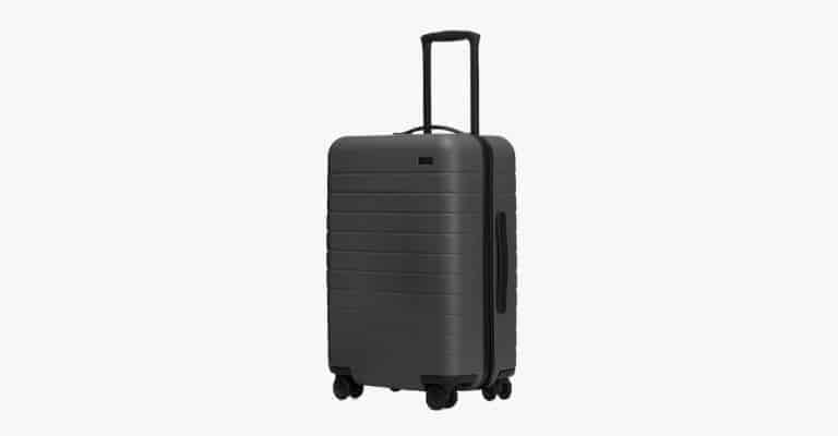 Dark grey suitcase.