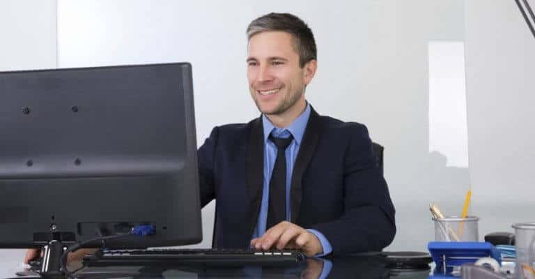 Example of good posture while sitting at a desk.