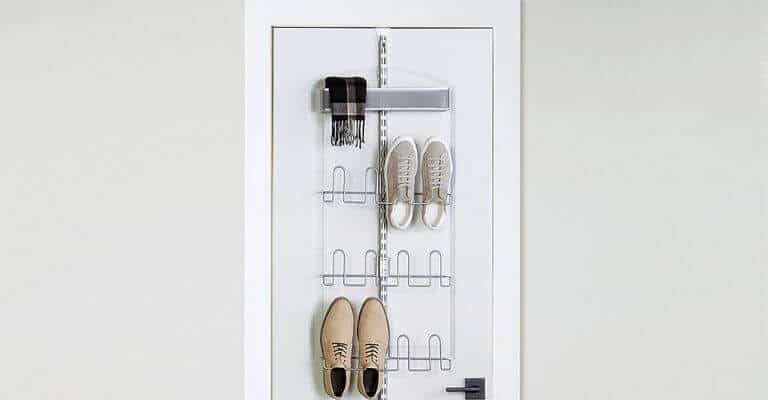 Silver door rack for clothes and shoes.