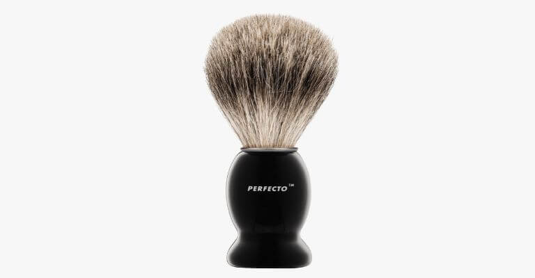 Badger shaving brush standing upright.