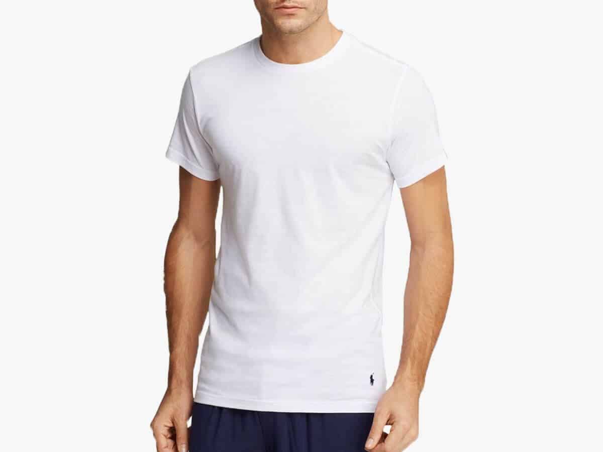 Person wearing a white crewneck undershirt.