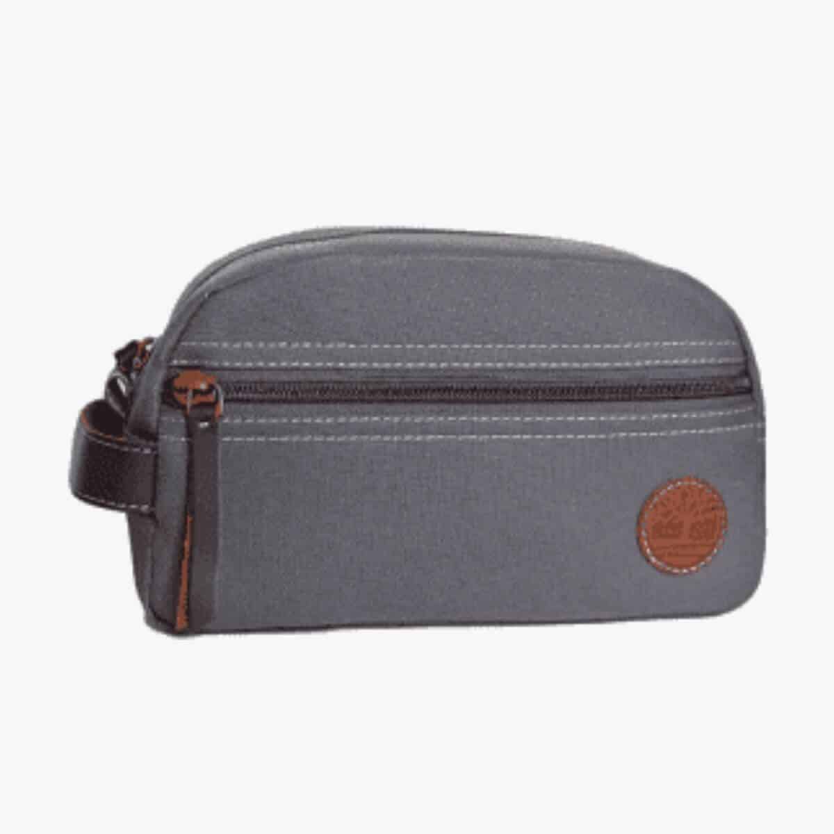 Grey canvas toiletry bag.