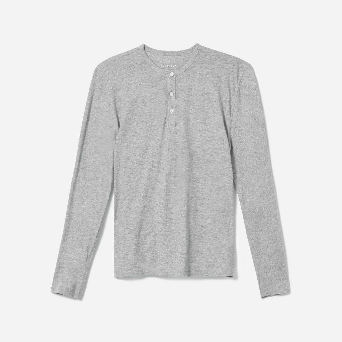 Grey long-sleeve henley shirt.