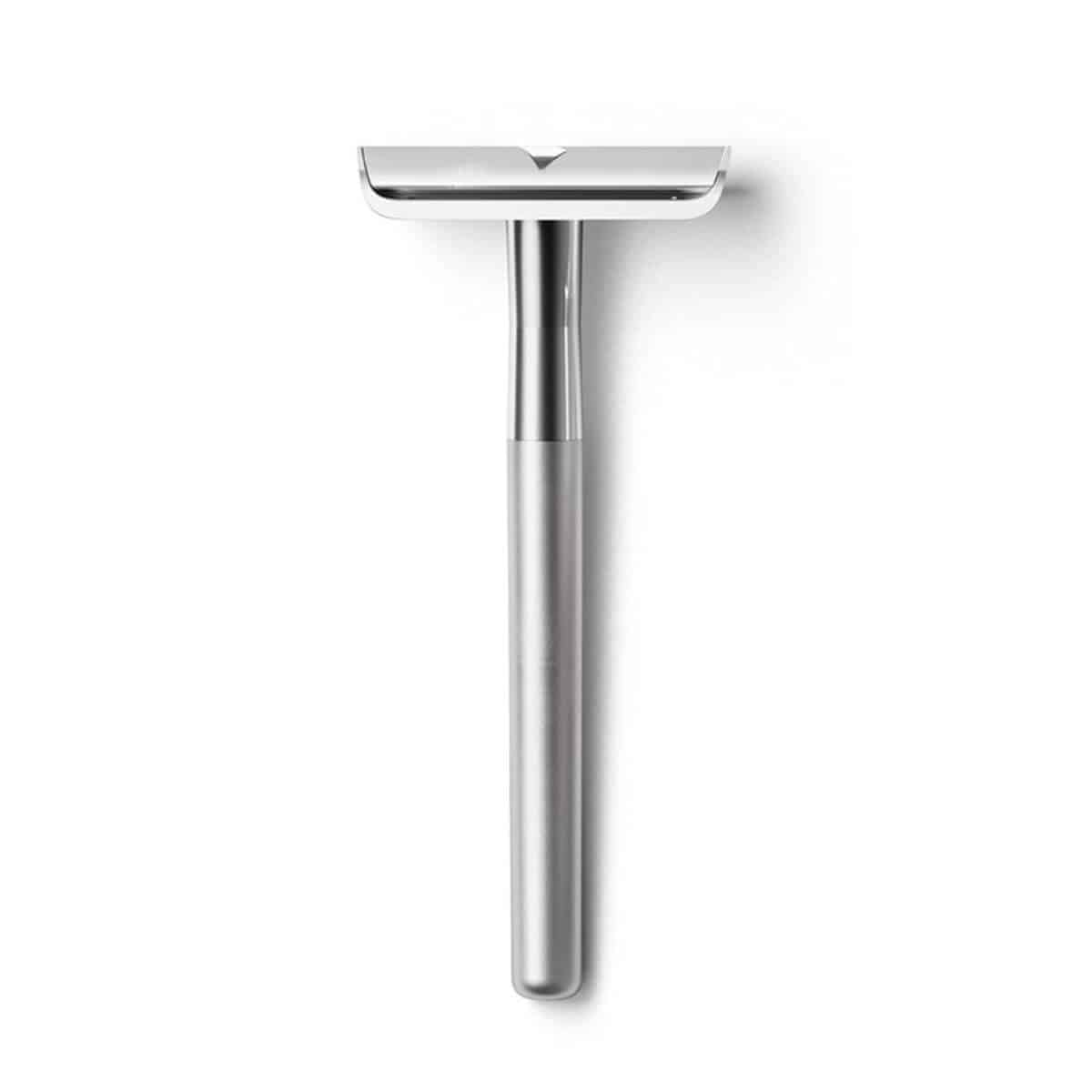 Silver safety razor.