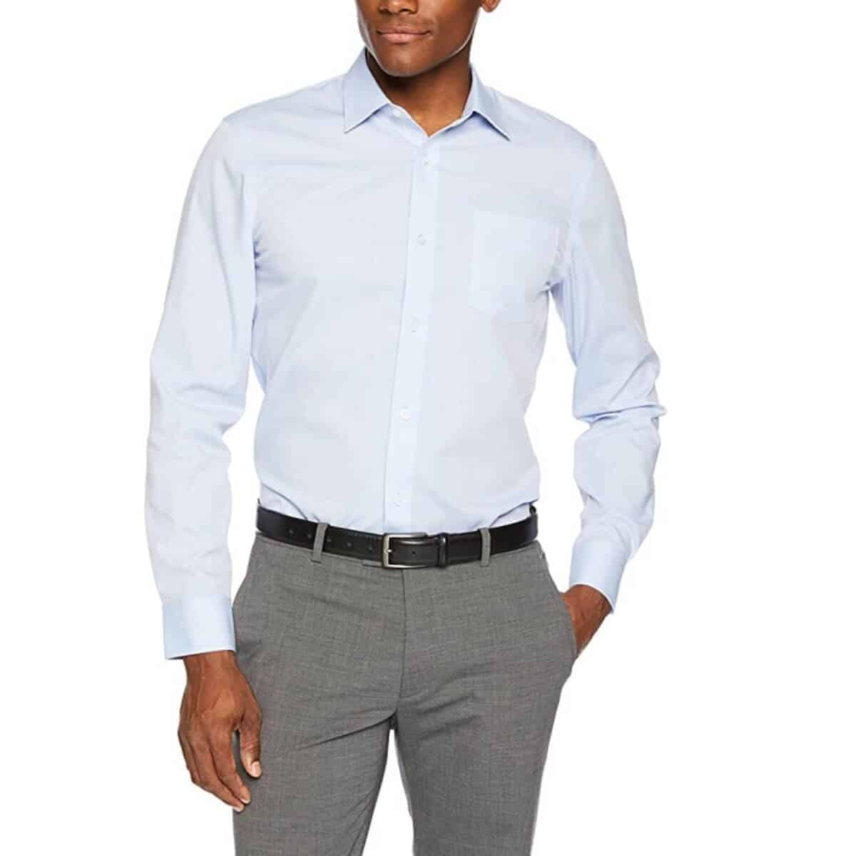 Top half of a person wearing a dress shirt.