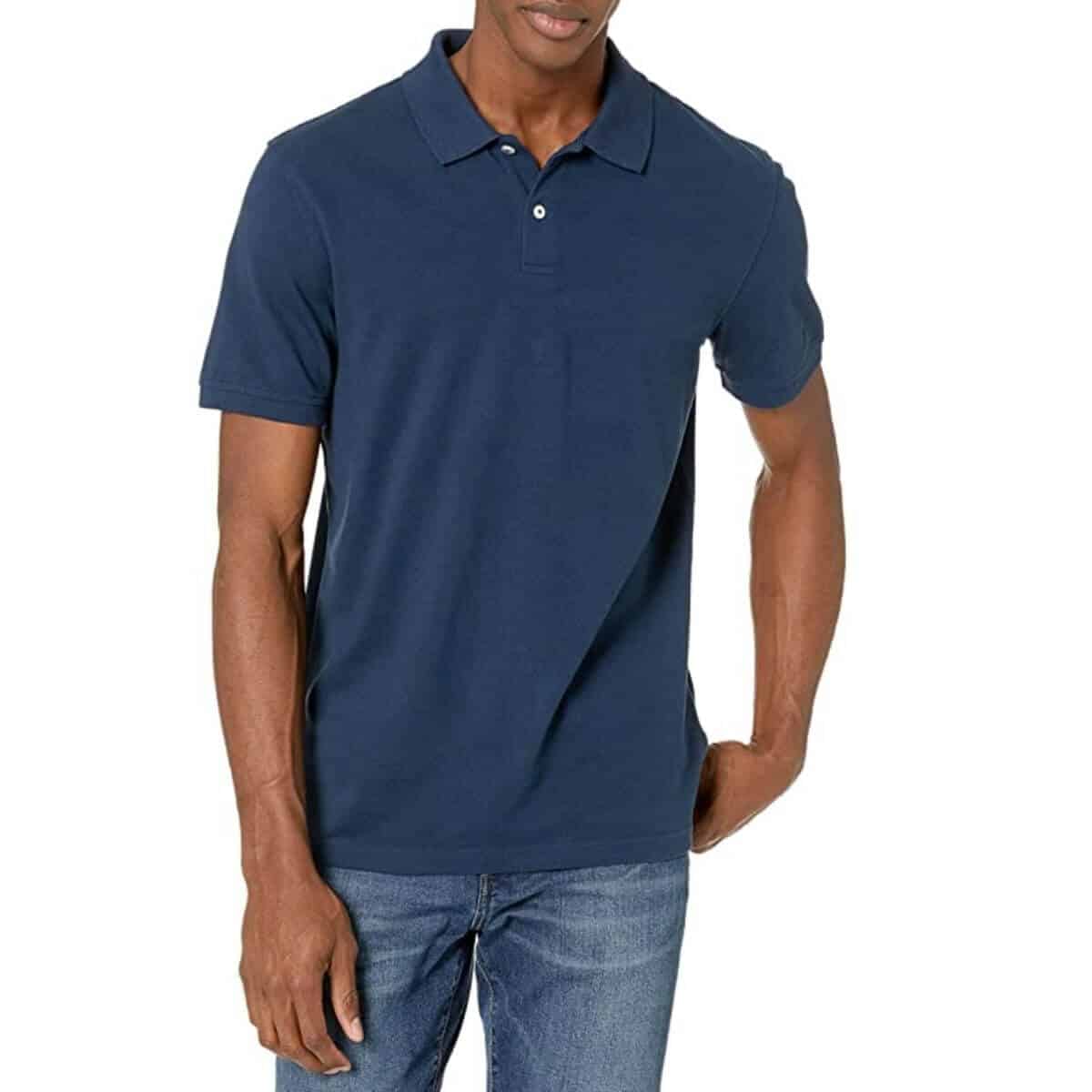 Top half of a person wearing a polo shirt and jeans.