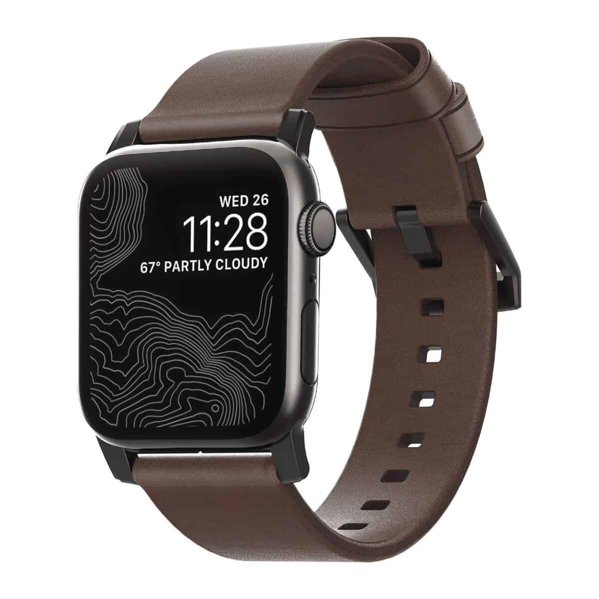 Apple Watch with a dark brown leather strap.