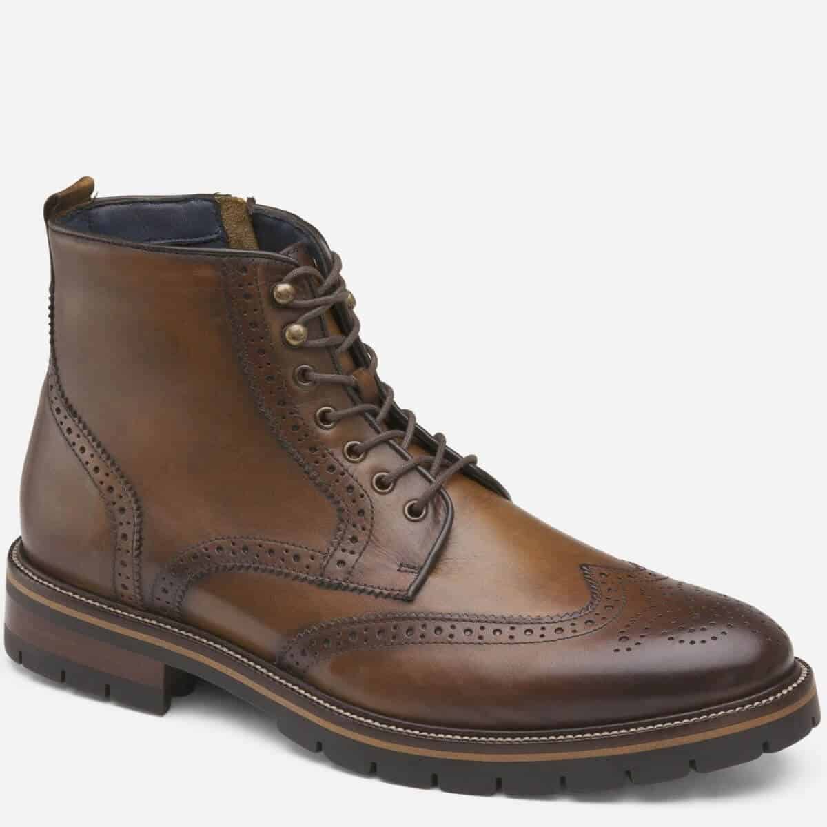 Brown leather wingtip brogue boot.