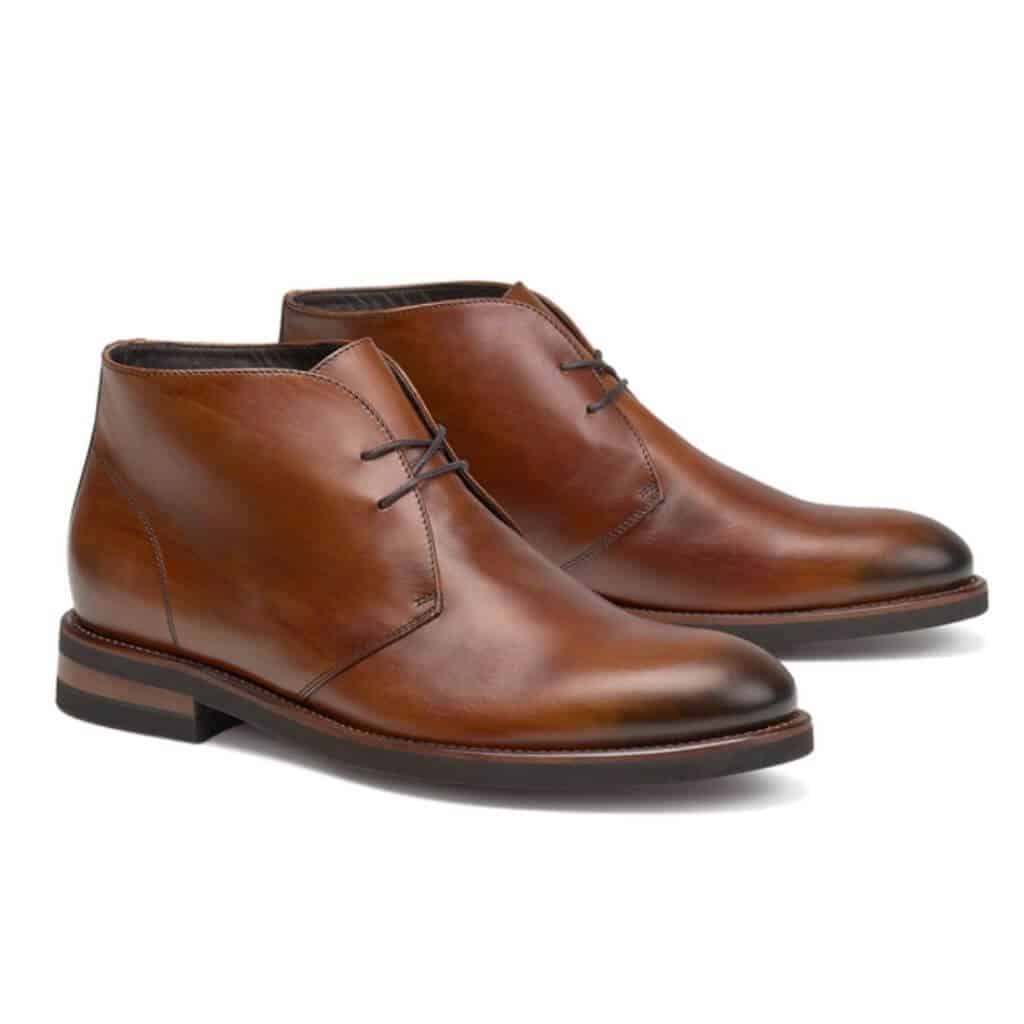 Brown leather Chukka boots.