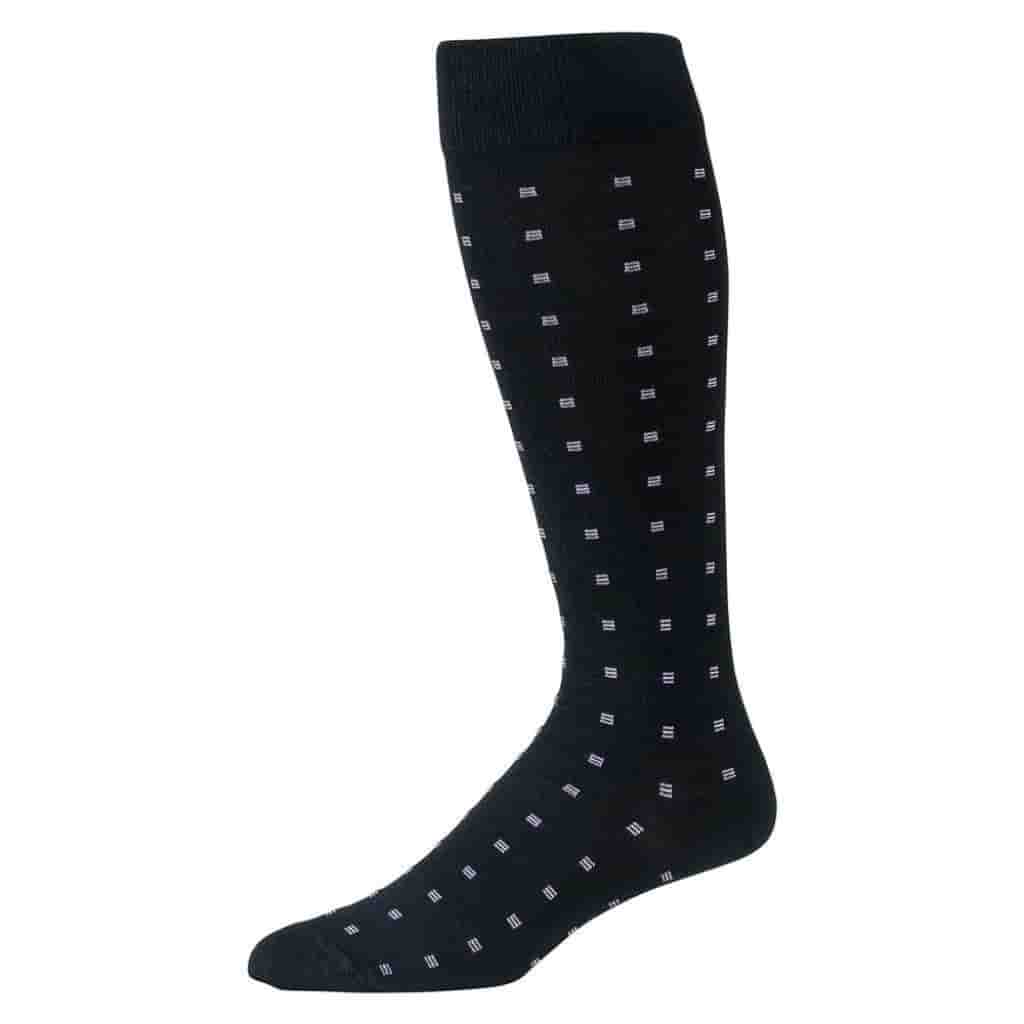 Black over-the-calf socks with small purple squares on it.