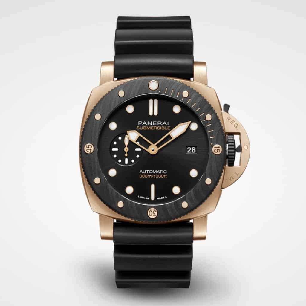 Panerai Submersible watch with a gold case and black strap.