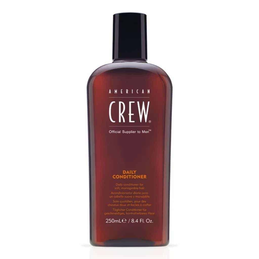 Bottle of American Crew hair conditioner.