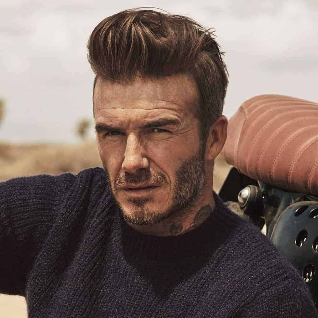 David Beckham with a pompadour haircut.