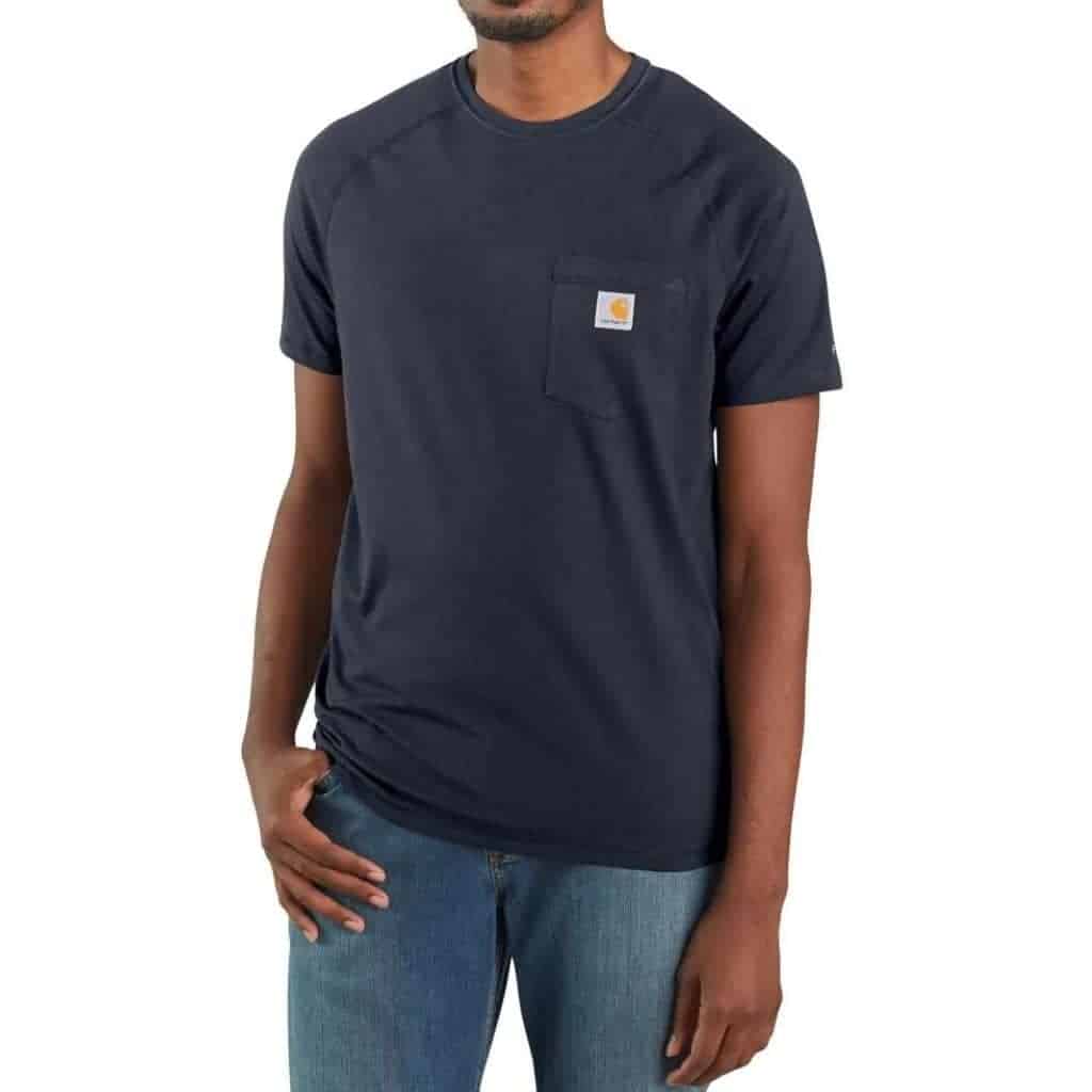 Close-up of a person wearing a Carhartt t-shirt and jeans.
