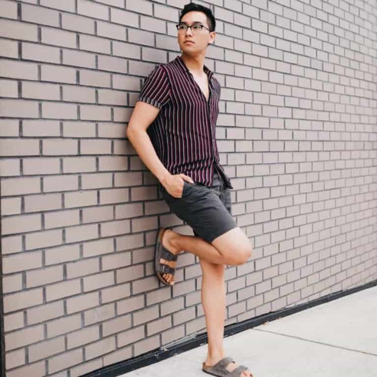 Person Shorts Leaning Wall 768x768 