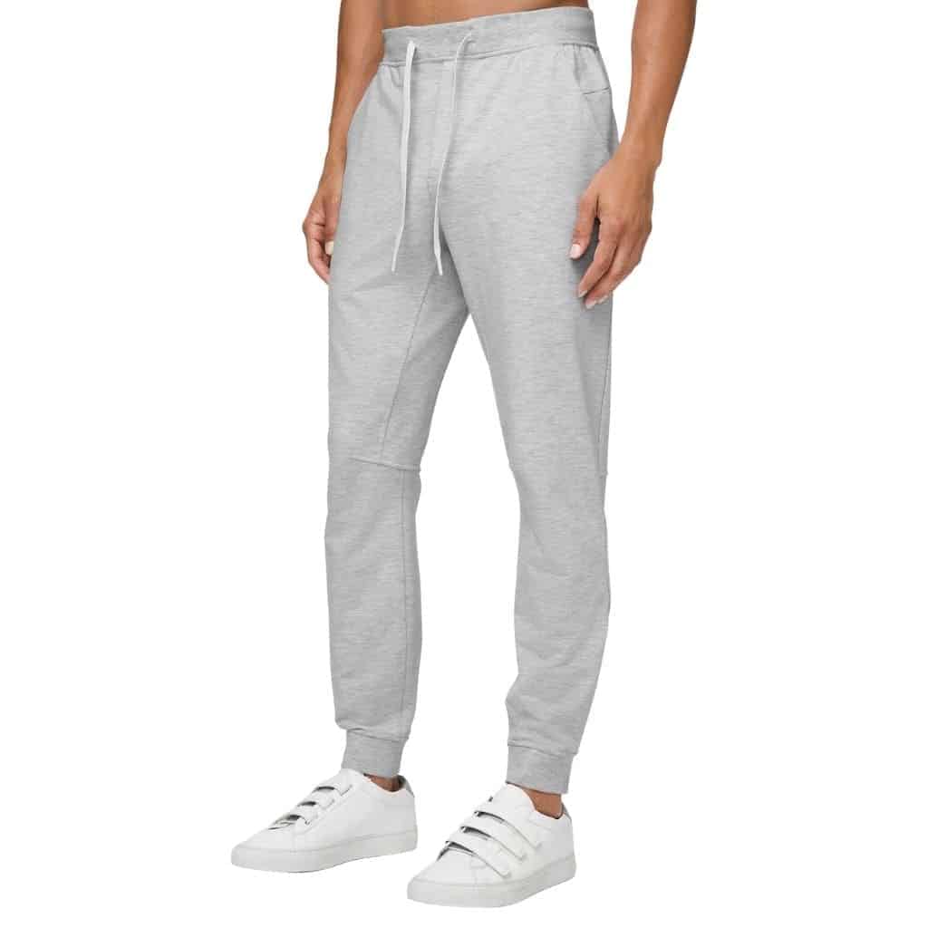 Lower half of a person wearing Lululemon joggers.