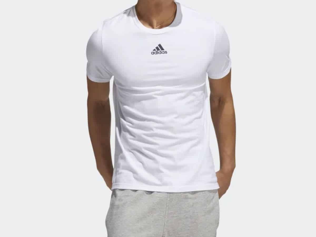 Person wearing an Adidas t-shirt and sweatpants.