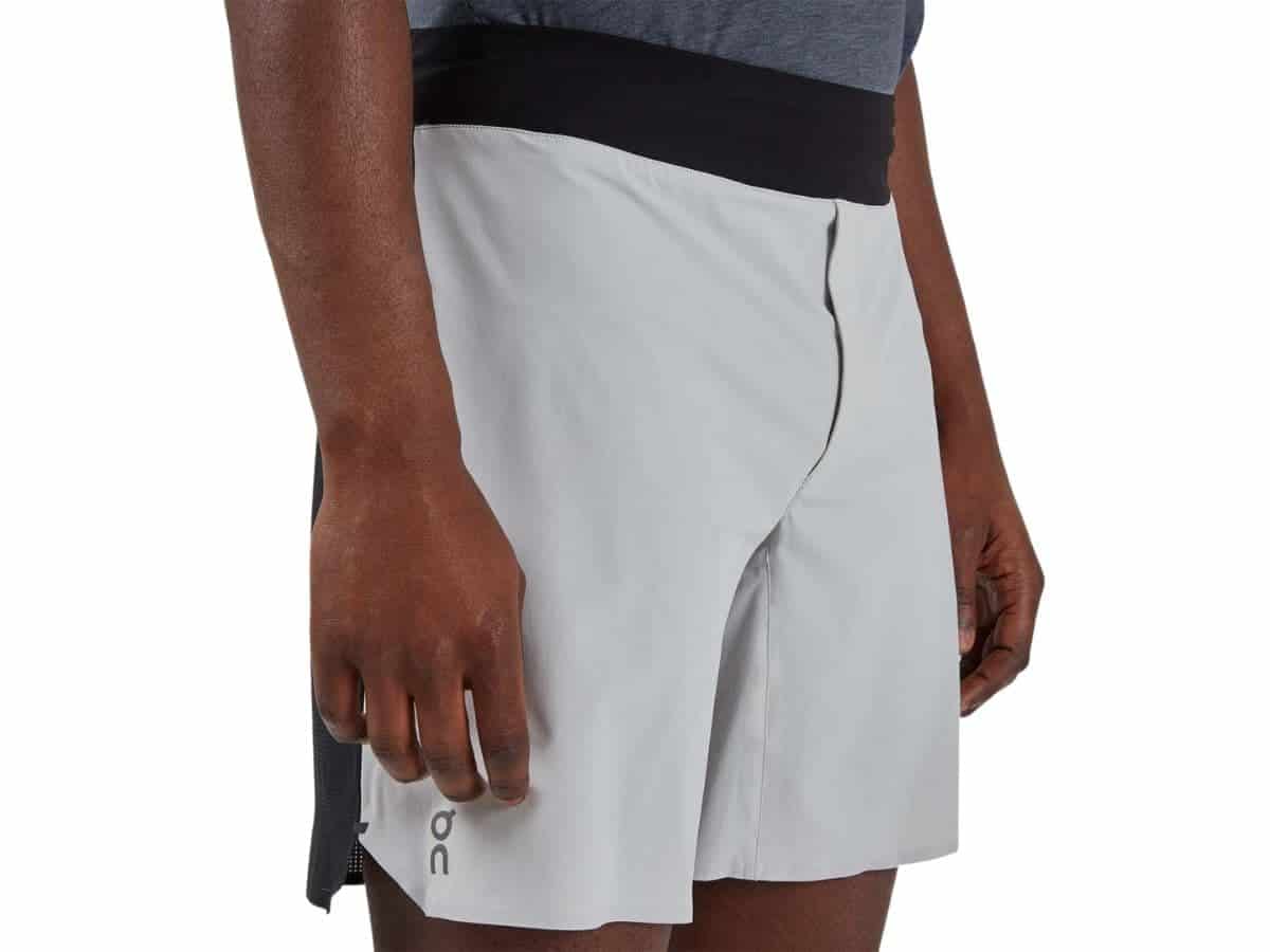 Close-up of a person wearing On Running shorts.