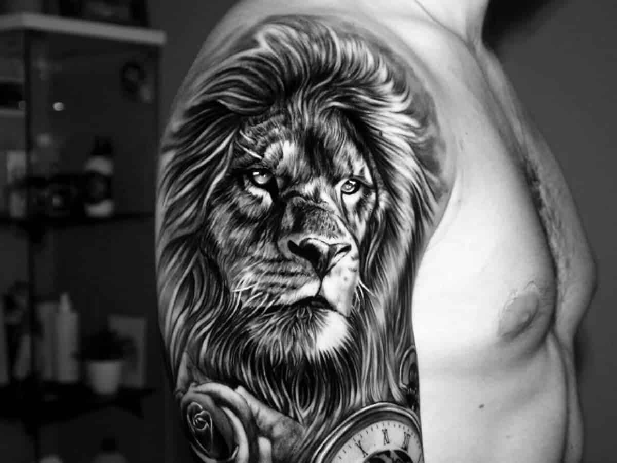 Lion shoulder tattoo.