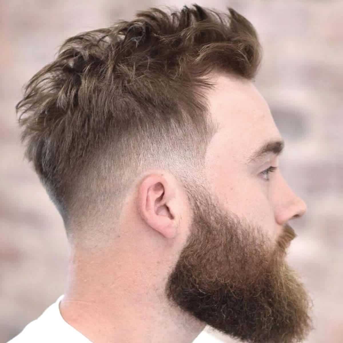 Person with a mid-fade haircut.