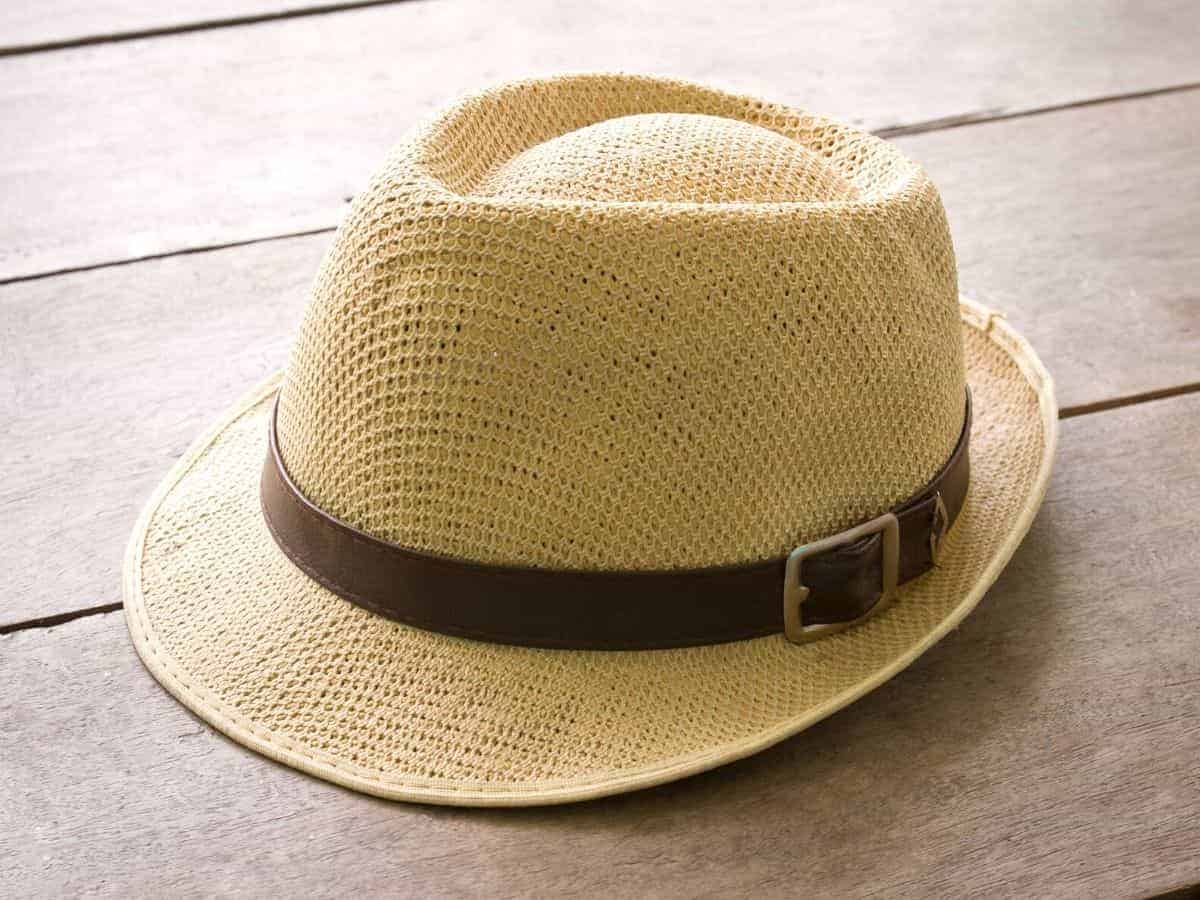 Panama hat on a wooden table.