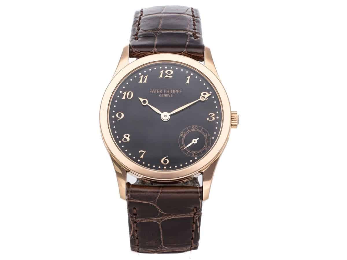 Patek Philippe Calatrava watch with a brown leather strap.