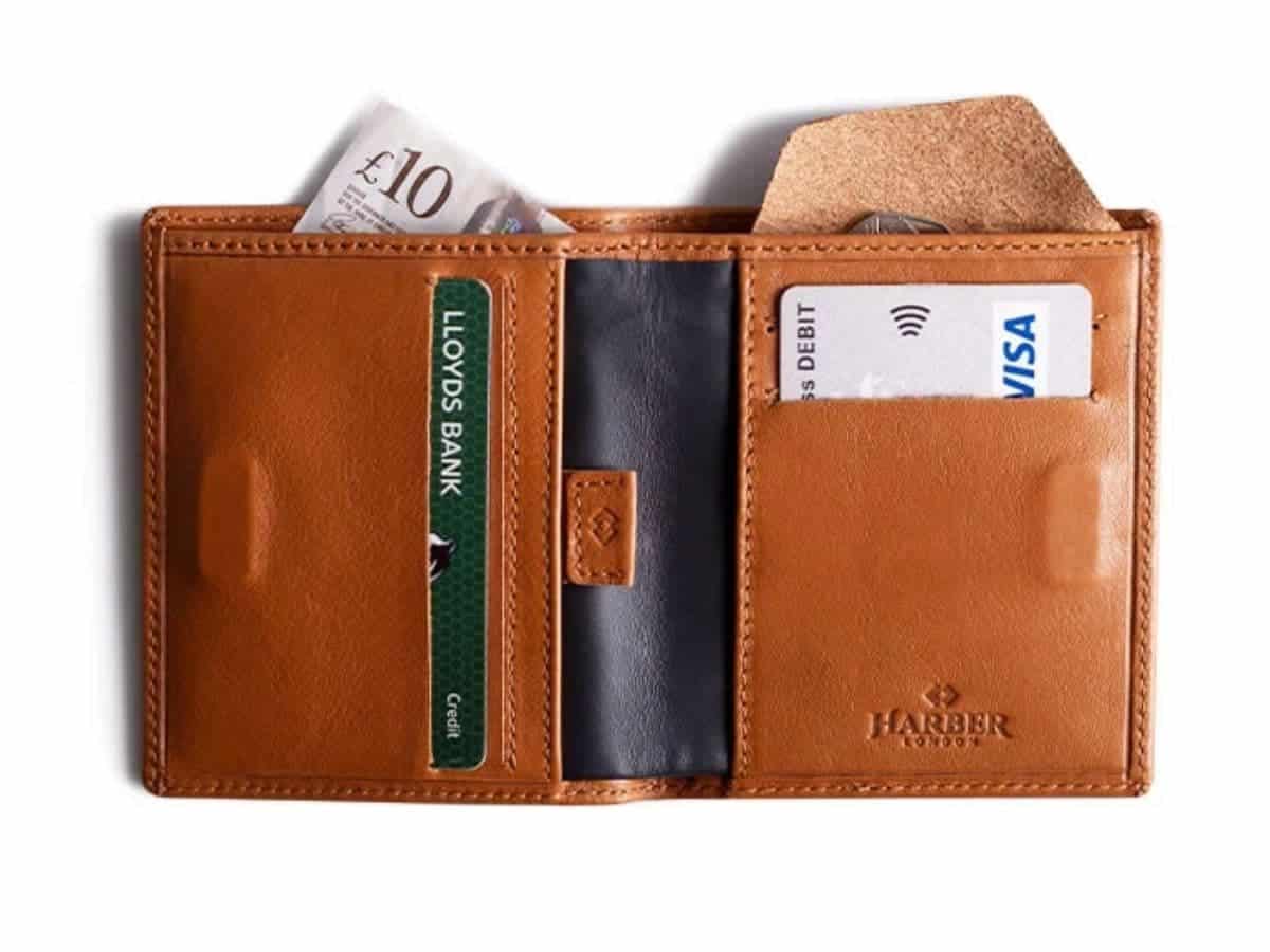 Open Harber London wallet with cards and cash.