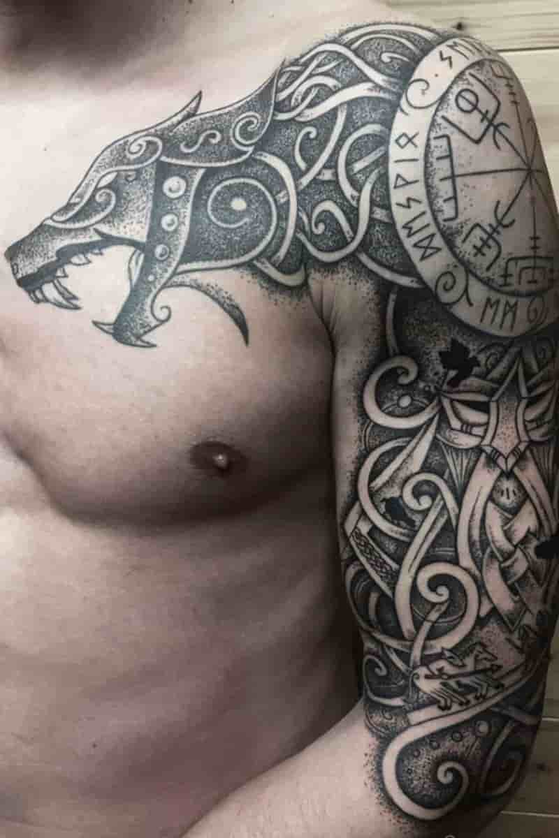 Celtic tattoo on a person's chest and arm.