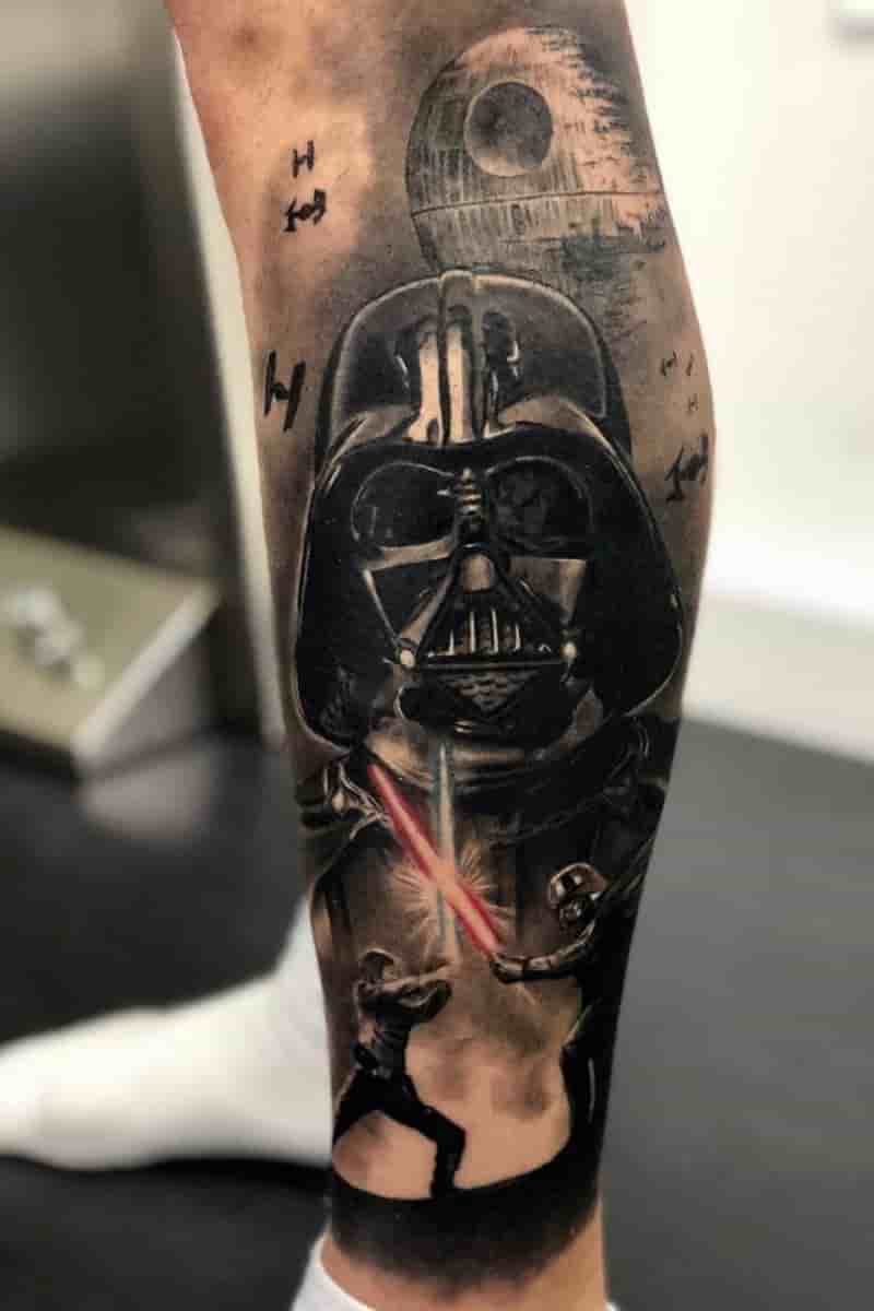 Star Wars tattoo on a person's leg.