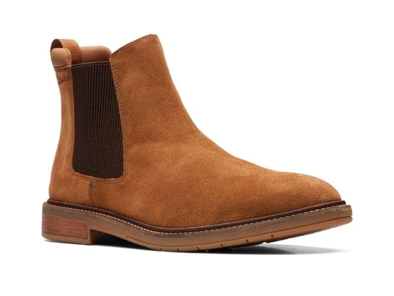 Suede Chelsea boot with a wood and rubber sole.