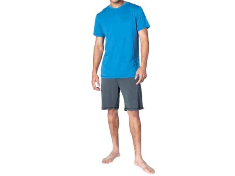 Person wearing shorts and a v-neck shirt.