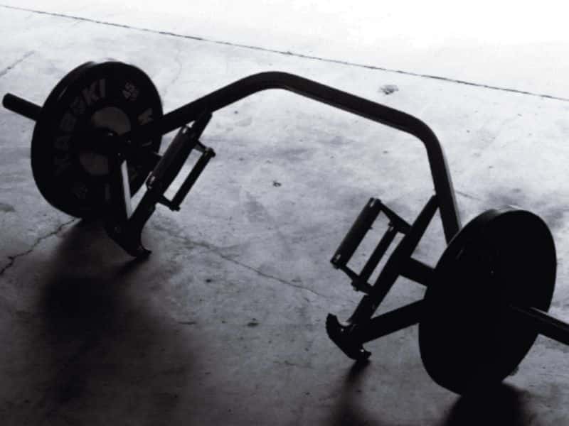Kabuki Strength trap bar with weights on it.