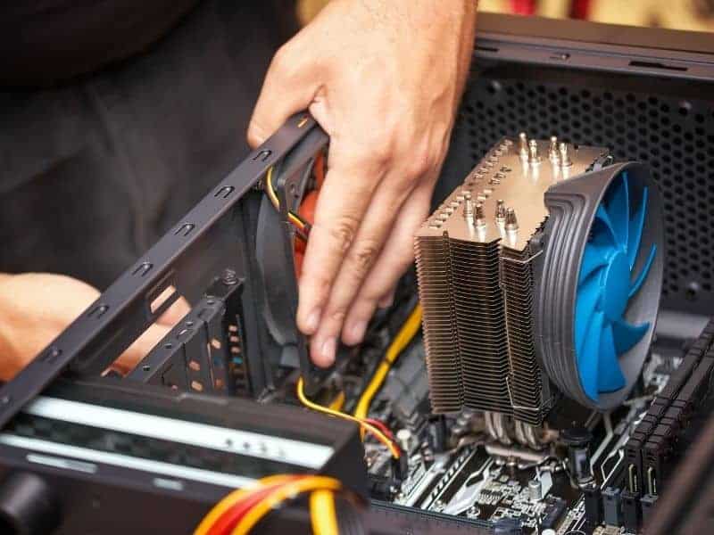 Person building a personal computer.