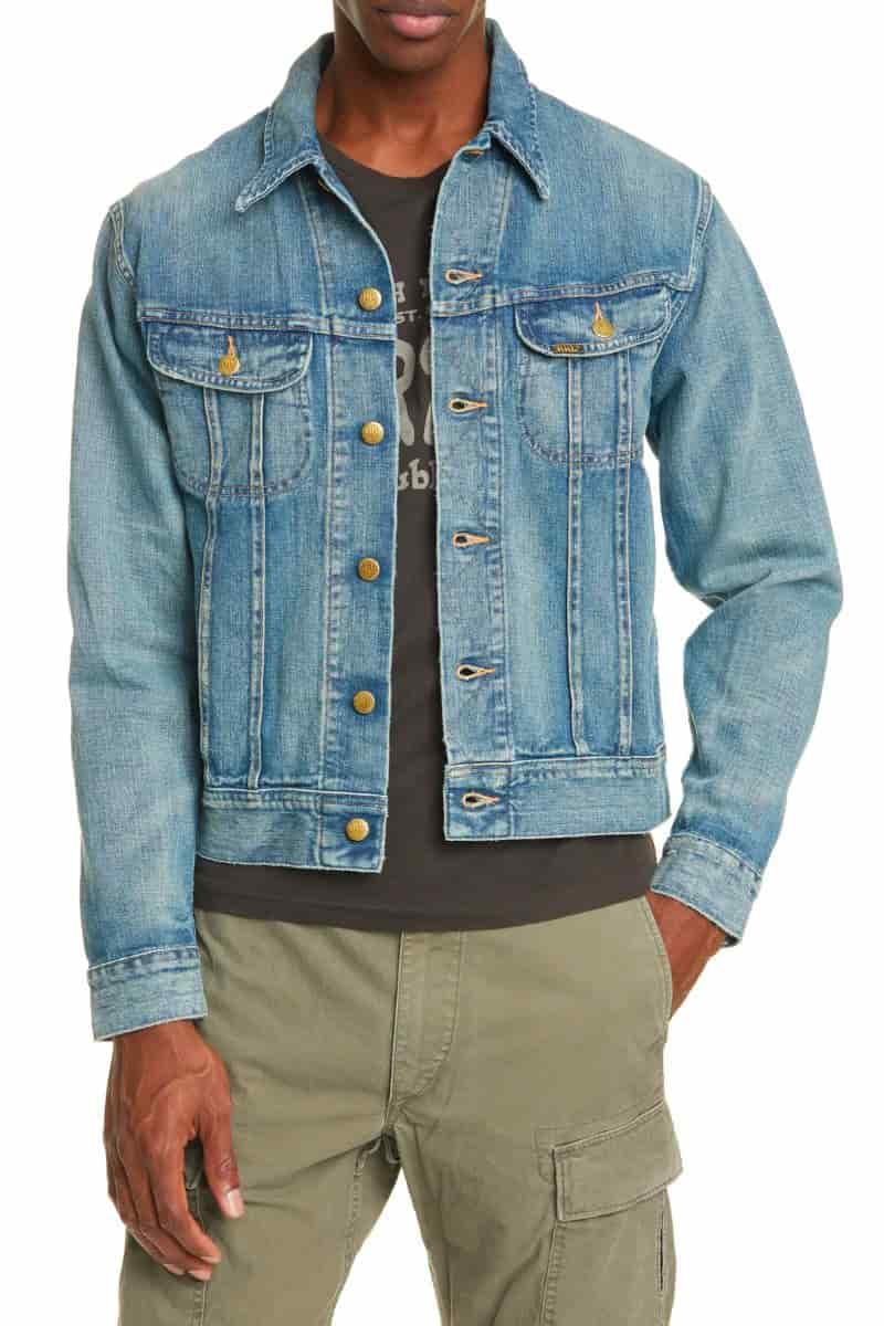 Person wearing a denim jacket with a t-shirt and cargo pants.