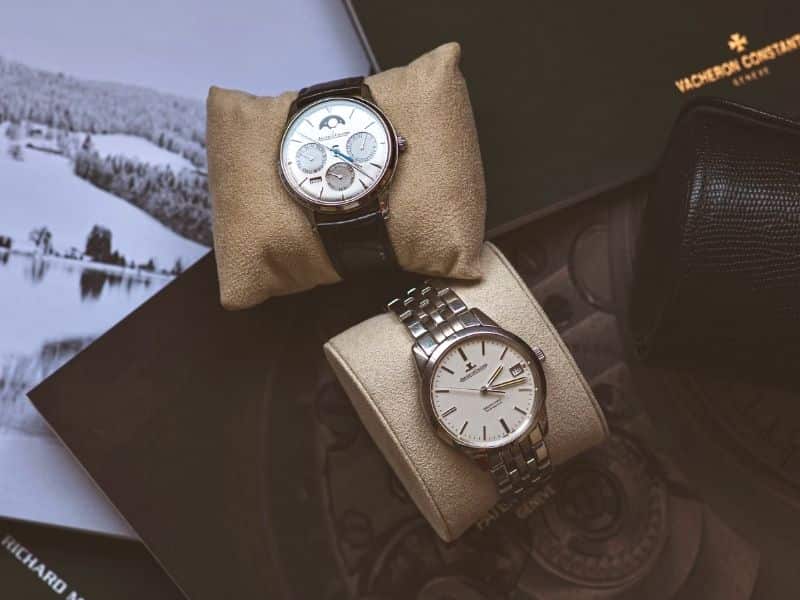 Two watches on boxes.