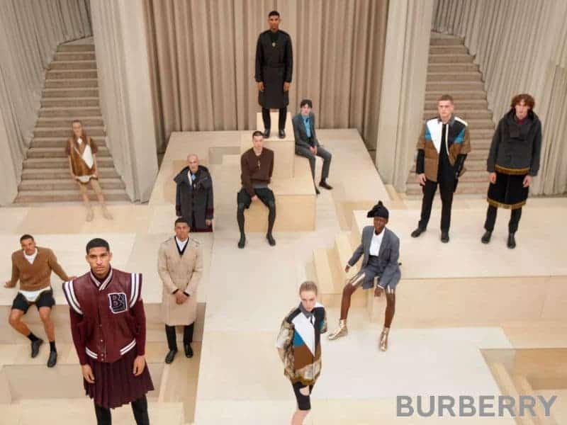 Burberry models standing in a store.