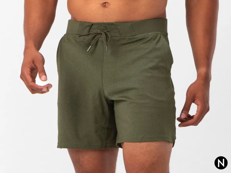 Close-up of a person wearing athletic shorts.